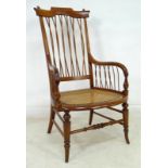 An early Arts and Crafts nursing chair,