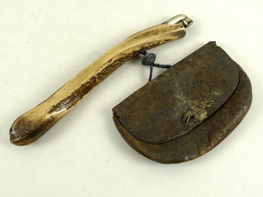 A Japanese kiseru (pipe) and tobacco pouch, Meiji period, late 19th century,