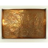 A Keswick copper tray, the body chased and embossed with scrolling foliage, rolled rims,