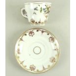 A Continental 19th century part tea set, comprising nine cups, 11 by 7cm, twelve saucers, 14cm,