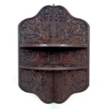 A set of Aesthetic movement mahogany corner wall shelves, circa 1880,