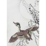 A Japanese coloured woodblock study of a duck in flight, with signature top right, 20 by 14cm,