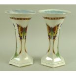 A pair of Crown Ducal Art Nouveau lustre vases, each decorated with vibrant red,
