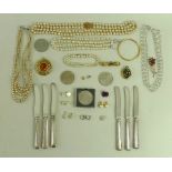 A collection of costume jewellery and coins, including simulated pearls,