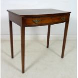 An early 19th century mahogany bow fronted side table,