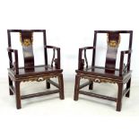 A pair of Chinese hardwood low back open armchairs, Qing Dynasty, late 19th century,