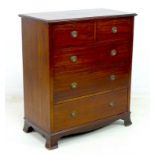 An Edwardian mahogany chest of two short over three long graduating drawers,