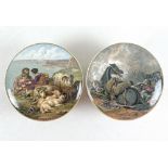 A pair of 19th century pot lids, comprising 'War',