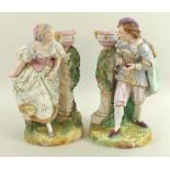 A pair of 19th century biscuit porcelain figures,