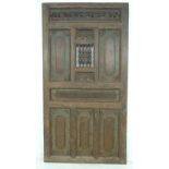 A set of Moorish carved wooden doors, possibly 19th century, carved with motifs, 99 by 6 by 187.