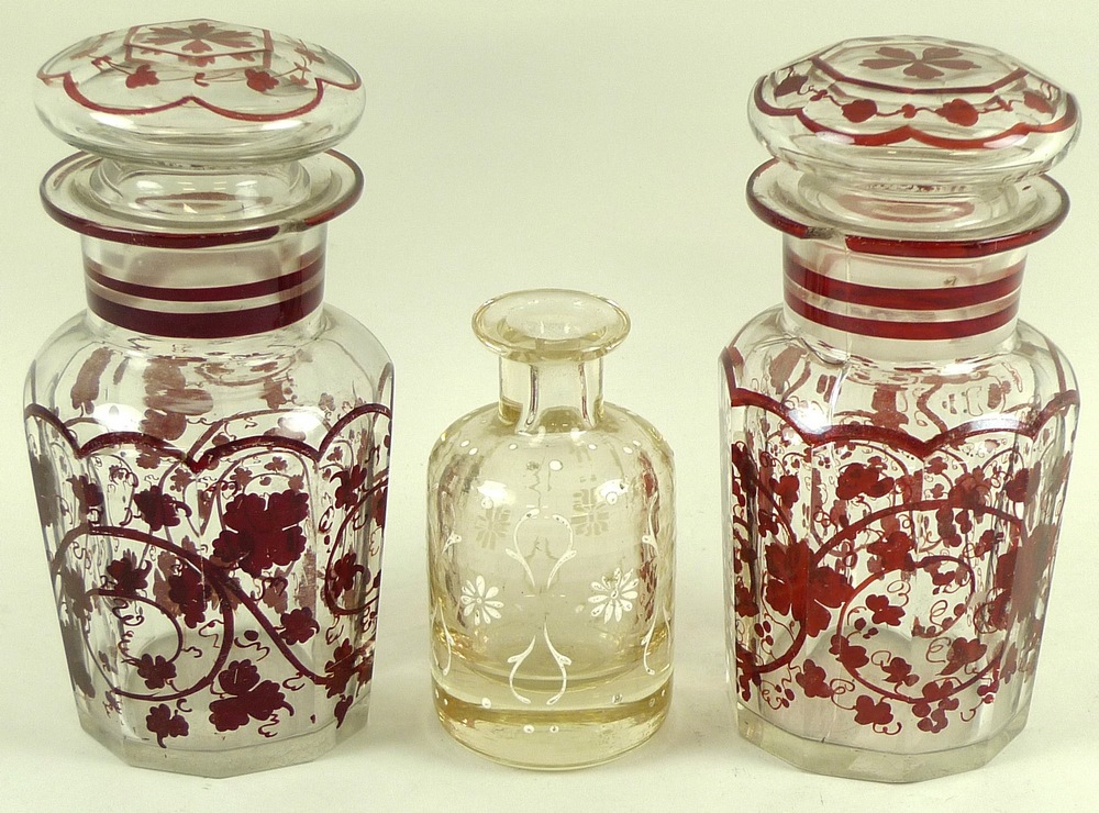 A pair of Continental glass faceted pickle jars and covers, late 19th century,