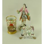 A Continental painted porcelain figure of a French nobleman with pink frock coat, 19th century,