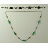 A 9ct gold and green stone necklace,