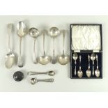 A selection of silver items including a near pair of George III Old English pattern sauce ladles,