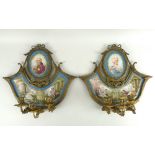 A pair of 18th century Sevres wall sconces, painted by Jean Baptiste Etienne Genest (French,