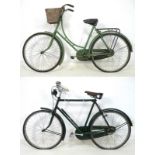 Two vintage bicycles, circa 1930's, both painted green, a lady's, 190 by 44 by 116cm high,