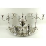 A set of silver plated items, comprising a pair of Victorian three branch candelabra,