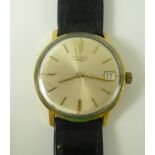 A Longines gentleman's gold cased wristwatch, circa 1965, champagne dial with gold baton numerals,