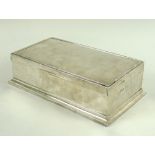 A silver games box for card decks and other accoutrements for Bridge,