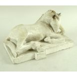 A mid 20th century metal framed plaster sculpture of a mare lying down, her mane hogged,