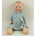 An Armand Marseille bisque headed doll, closing eyes and articulated limbs,