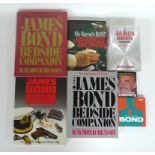 A group of James Bond reference books,