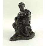 A bronze, modelled after a classical female figure, holding a tablet and a trumpet,