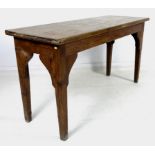 A Victorian pine table with single plank top, raised on square section tapering legs, 152.