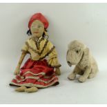 A mohair vintage dog of rod and straw construction, with glass eyes,