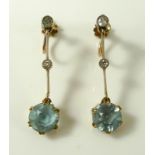 A pair of late Victorian / Edwardian 9ct gold drop earrings, set with aquamarines and diamond chips,