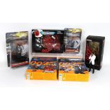 A group of five James Bond action figures, comprising two Action Man 12 inch collector's figures,