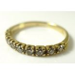 An 18ct gold half eternity diamond ring, 0.32 total diamond weight, size L, 1.