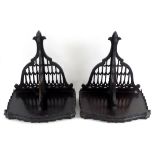 A pair of ebony Gothic hanging brackets,