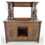 An Edwardian mahogany sideboard, mirrored back with bevelled plates,