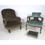 An Edwardian stained mahogany tub chair, with bowed rail supported on turned vase shaped splats,