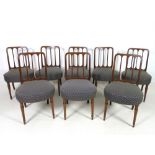 A set of eight William IV mahogany dining chairs, three splat back with rounded top corners,