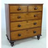A Victorian oak and stained pine chest of two over three graduating drawers,