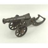 A mid 20th century cast iron model of a 19th century war cannon, military vector gun, 12.