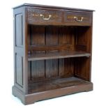 A modern Indian hardwood bookcase with two drawers,