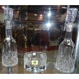 A pair of Waterford cut crystal decanters and stoppers, with etched mark to base, 33cm high,