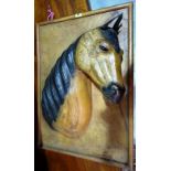 A 20th century brown leather wall plaque modelled as a horse.