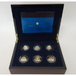 Twelve silver and gilt curved triangular commemorative coins, 2007, commemorating Bermuda shipwrecks