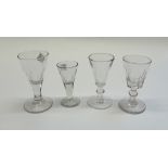 A group of twenty five small drinking glasses, mostly early 19th century,