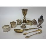 Silver, comprising; five napkin rings, a model of The Coronation Anointing Spoon, London 1910,