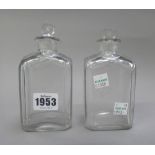 A pair of engraved glass spirit decanters and stoppers, 19th century, of canted rectangular section,