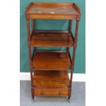 A Regency rosewood four tier what-not on turned supports, with single drawer base,