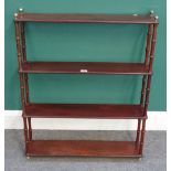 A set of 19th century mahogany hanging four tier open shelves on turned supports,