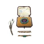 An amethyst, half pearl and turquoise set oval brooch,