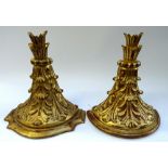 A near pair of 18th century style gilt wall brackets, with leaf moulded bodies,