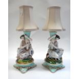 A pair of Continental porcelain candlesticks, French or German, late 19th,